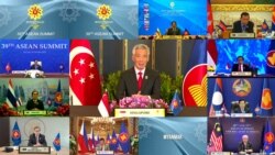 This handout photo released by the host broadcast, ASEAN Summit 2021, on October 26, 2021 shows Singapore's Prime Minister Lee Hsien Loong (C) taking part in the 39th Association of Southeast Asian Nations summit.