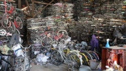 One of Shiek Chhai's three warehouses contains around 5,000 bikes, from street to city to children's two wheelers. (Kiana Duncan/VOA Khmer)