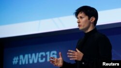 FILE - Pavel Durov delivers a keynote speech during the Mobile World Congress in Barcelona, Feb. 23, 2016. Durov was detained at Le Bourget airport outside Paris on Aug. 24 and then charged with violations related to the messaging app.