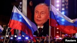 Ruski predsjednik Vladimir Putin na mitingu povodom 10-godišnjice nelegalne ruske ankesije ukrajinskog poluostrva Krim (Foto: REUTERS)