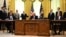 U.S. President Donald Trump (C), Serbian President Aleksandar Vucic (L) and Kosovo Prime Minister Avdullah Hoti (R) listen as U.S. Vice President Mike Pence speaks during a signing ceremony in the White House in Washington, Sept. 4, 2020.