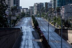 Roads in the capital lie empty after they were closed to be disinfected to halt the spread of the new coronavirus, in Addis Ababa, Ethiopia, March 29, 2020.