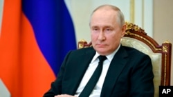 资料照片：俄罗斯总统普京在莫斯科主持国家安全委员会视频会议。(2023年7月21日)