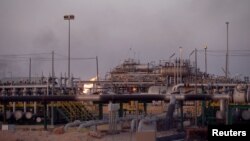 Lapangan minyak al-Zubair dekat Basra, Irak, 15 Juli 2018. 