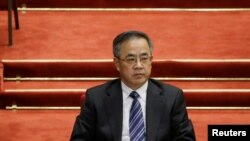 Tamil women greet each other as they cook special food to celebrate the harvest festival of Pongal at Dharavi, one of the Asia&#39;s largest slums, in Mumbai, India.