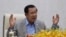 FILE: Cambodia's Prime Minister Hun Sen gestures during a speech on the current state of a new virus from China in Phnom Penh, Cambodia, Thursday, Jan. 30, 2020. Cambodia's leader has urged citizens to remain calm about the new virus from China, which has been confirmed in a sing
