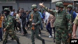 Corneille Nangaa (à dr.), le coordinateur de l'Alliance fleuve Congo (AFC), dont fait partie le M23.