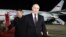 FILE - Russian President Vladimir Putin, right, walks as North Korea's leader Kim Jong Un shakes hands with the Russian delegation during their meeting at the Pyongyang Sunan International Airport outside Pyongyang, North Korea, early Wednesday, June 19, 2024.