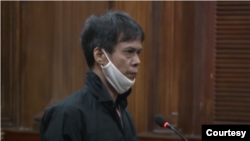 FILE - Pham Chi Dung appears at his trial in Ho Chi Minh City, Vietnam, on Jan. 5, 2021. (Photo: Nguoi Lao Dong)