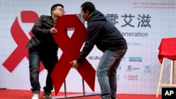 在北京的第27个世界艾滋病日主题宣传活动中（2014年11月27日）美联社）