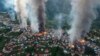 Fires burn in town of Thantlang in Myanmar's northwestern state of Chin, Oct. 29, 2021. More than 160 buildings in the town, including 3 churches, have been destroyed by fire caused by shelling by government troops.