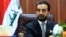 FILE - Iraqi Parliament Speaker Mohammed al-Halbousi meets with Basra provincial Council members in Basra, Iraq, Sept. 18, 2018.