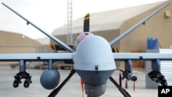 资料照片：美国在阿富汗坎大哈机场展出的MQ-9 型无人机（2018年1月23日）