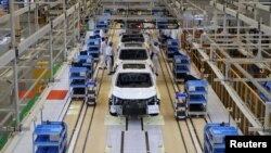 资料照：中国东风汽车集团在武汉的本田汽车生产线。（2019年4月12日）