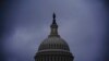 FILE - The light in the cupola of the Capitol Dome signals that the Senate remains in session overnight, in Washington, Oct. 25, 2020.
