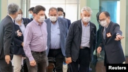 French Senator Alain Richard leads a group of delegates arriving at Taoyuan International airport in Taoyuan, Taiwan, October 6, 2021. 