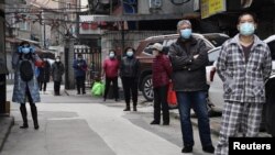 Izolacija se u provinciji koja je bila žarište korona virusa ipak ukuda postepeno, Foto: REUTERS/Stringer CHINA OUT. - RC2PDF9U1064