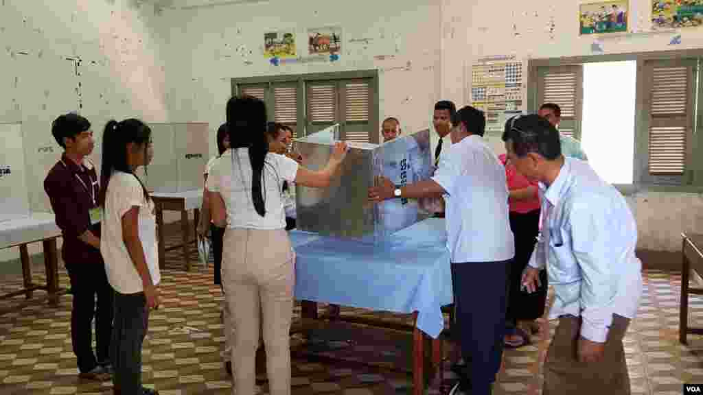 A woman cleans SS. Quirico and Giulitta Church in Giussano, Italy. Churches in Italy are preparing to reopen to the public for masses after Italy partially lifted restrictions following a two-month lockdown due to COVID-19.