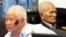 FILE - Khieu Samphan, left, former Khmer Rouge head of state, and Nuon Chea, Khmer Rouge's chief ideologist and No. 2 leader, sit in the court room before they made closing statements at the U.N.- backed war crimes tribunal in Phnom Penh, Oct. 31, 2013. 