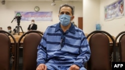 Džamšid Šarmad prisustvuje prvom saslušanju na suđenju u teheranu, 6. februara 2022.