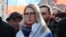 FILE - Russian opposition figure Lyubov Sobol takes part in a rally to mark the 5th anniversary of opposition politician Boris Nemtsov's murder and to protest against proposed amendments to the country's constitution, in Moscow, Feb. 29, 2020. 