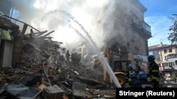 Posledice ruskog raketnog napada na stambeni blok u Zaporožju (Foto: EUTERS/Stringer)