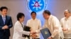 Japan, Philippines sign defense pact in the face of shared alarm over China 