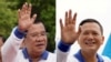 File: Perdana Menteri Kamboja Hun Sen (kiri), 1 Juli 2023 dan Hun Manet (kanan) dalam kampanye pemilu di Phnom Penh, Kamboja, 21 Juli 2023. (REUTERS/Cindy Liu)