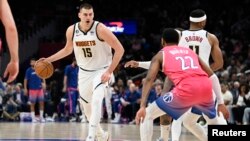 Nikola Jokić na utakmici protiv Vašington Vizardsa, 22. mart 2023. (Foto: Reuters/Brad Mills-USA TODAY Sports)
