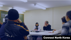 Connect North Korea holds a meeting with defectors. At center is Jihyun Park, and Michael Glendinning is at right. (Connect: North Korea)