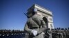 Soldiers of the French Foreign Legion stand before the beginning of the ceremony marking the 73rd anniversary of the victory over Nazi Germany during WWII, May 8, 1945, under the Arc de Triomphe in Paris, May 8, 2018.