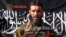 FILE - Wanted terrorist Mokhtar Belmokhtar speaks in this undated still image taken from video released by Sahara Media, Jan. 21, 2013.