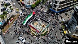 Palestinians react during a rally as they mark the 75th anniversary of Nakba in Ramallah in the Israeli-occupied West Bank May 15,2023.