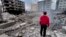 A man looks at buildings destroyed by Israeli airstrikes in Dahiyeh, Beirut, Lebanon, on Oct. 7, 2024.