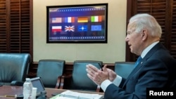 2022年1月24日，美国总统拜登在白宫与欧洲领导人讨论俄罗斯和乌克兰局势。（照片由白宫提供给路透社）。