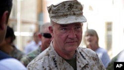 FILE - Marine Gen. Frank McKenzie, the head of U.S. Central Command, attends a ceremony at Resolute Support headquarters, in Kabul, Afghanistan, July 12, 2021.