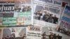 FILE - Front pages of Thai newspapers in Bangkok.