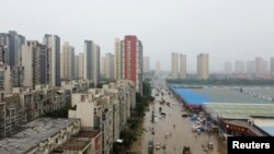 An aerial view shows a flooded road following heavy rainfall in Zhengzhou, Henan province, China, July 23, 2021. 