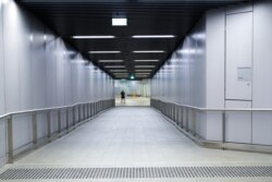 A man walks at a desert train station amid the spread of the coronavirus disease (COVID-19) in Sydney, Australia, April 6, 2020.