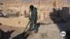 Landmines slow return to Palmyra, Syria, home of famed ancient ruins 