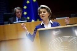 European Commission President Ursula Von Der Leyen addresses European lawmakers during a plenary session on the inauguration of the new U.S. president and the current political situation, at the European Parliament in Brussels, Jan. 20, 20
