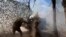 FILE - A Russian soldier fires from a howitzer toward the Ukrainian position in the Russian-Ukrainian border area in ​​the Kursk region, Russia, Oct. 28, 2024, in this photo taken from video released by the Russian Defense Ministry.