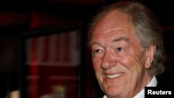FILE PHOTO: Actor Michael Gambon arrives for the premiere of "Harry Potter and the Half-Blood Prince" in New York