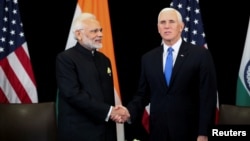 美国副总统彭斯在新加坡东盟峰会期间与印度总理莫迪举行双边会谈。（2018年11月14日）
