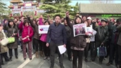 马航MH370中国乘客家属为亲人祈福