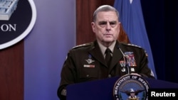 FILE - Joint Chiefs of Staff Chairman General Mark Milley holds a news briefing at Pentagon in Arlington, Virginia, Aug. 18, 2021. 