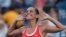 Roberta Vinci of Italy celebrates with the crowd after defeating Serena Williams of the US in their women's singles semi-final match at the US Open Championships tennis tournament in New York, Sept. 11, 2015.