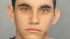 Nikolas Cruz appears in a police booking photo after being charged with 17 counts of premeditated murder following a Parkland school shooting, at Broward County Jail in Fort Lauderdale, Florida, Feb. 15, 2018.