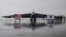 FILE - National flags of the United States and South Korea are displayed in front of a B-52H strategic bomber parked at a South Korean Air Force base at Cheongju Airport on October 19, 2023.