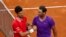 Novak Đoković i Rafael Nadal nakon finalnog meča na turniru u Rimu (Foto: REUTERS/Guglielmo Mangiapane)
